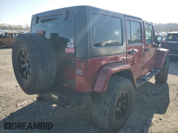 2012 Jeep Wrangler Unlimited Rubicon with VIN 1C4HJWFG4CL114089, listed as a Copart auction lot 49436495 with 189,079 mi miles and Salvage title. Bid and sale history available at DreamBid. Image 3.