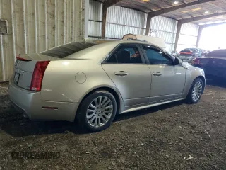 2013 Cadillac CTS Performance with VIN 1G6DK5E30D0157791, listed as a Copart auction lot 83798544 with 124,638 mi miles and Salvage Title. Bid and sale history available at DreamBid. Image 3.