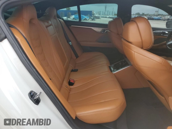 2020 BMW 8 Series M850i with VIN WBAGV8C00LCD38284, listed as a Copart auction lot 60605075 with 57,161 mi miles and Salvage title. Bid and sale history available at DreamBid. Image 10.