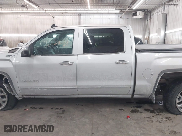 2015 GMC Sierra 1500 SLT with VIN 3GTU2VEC1FG519042, listed as a IAAI auction lot 41629031 with 163,856 mi miles and . Bid and sale history available at DreamBid. Image 14.