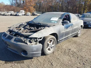 2002 Pontiac Grand Prix GT z VIN 1G2WP52K82F256389, wystawiony jako IAAI lot #40822299 z przebiegiem 178 940 mil mil oraz . Historia ofert i sprzedaży dostępna na DreamBid. Obrazek 2.