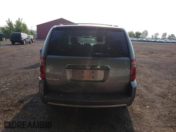 2009 Dodge Grand Caravan SE with VIN 2D8HN44E29R694728, listed as a Copart auction lot 60287565 with 233,018 mi miles and Clean title. Bid and sale history available at DreamBid. Image 6.