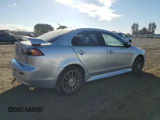 2015 Mitsubishi Lancer ES with VIN JA32U2FU4FU021260, listed as a Copart auction lot 77233514 with 99,548 mi miles and Salvage Title. Bid and sale history available at carsss.com. Image 3.