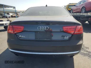 2011 Audi A8 z VIN WAURVAFD0BN005579, wystawiony jako Copart lot #59584025 z przebiegiem 95 704 mil mil oraz Szkoda całkowita • Salvage title. Historia ofert i sprzedaży dostępna na DreamBid. Obrazek 6.