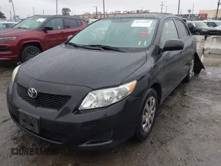 2009 Toyota Corolla with VIN JTDBL40E39J001203, listed as a IAAI auction lot 41579869 with 127,170 mi miles. Bid and sale history available at carsss.com. Image 2.