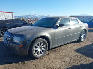 2008 Chrysler 300 LX with VIN 2C3KA43RX8H172037, listed as a IAAI auction lot 41429004 with 194,201 mi miles. Bid and sale history available at carsss.com. Image 2.