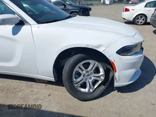 2022 Dodge Charger SXT with VIN 2C3CDXBG4NH197301, listed as a IAAI auction lot 42053688 with 60,592 mi miles and . Bid and sale history available at DreamBid. Image 6.