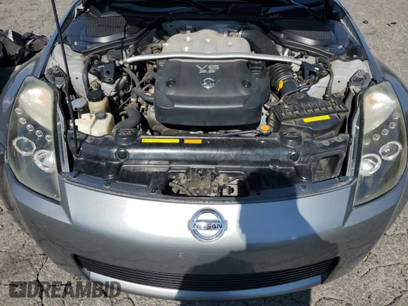 2004 Nissan 350Z Enthusiast z VIN JN1AZ36D34T110490, wystawiony jako Copart lot #57863915 z przebiegiem 139 757 mil mil oraz Szkody całkowita. Historia ofert i sprzedaży dostępna na DreamBid. Obrazek 11.