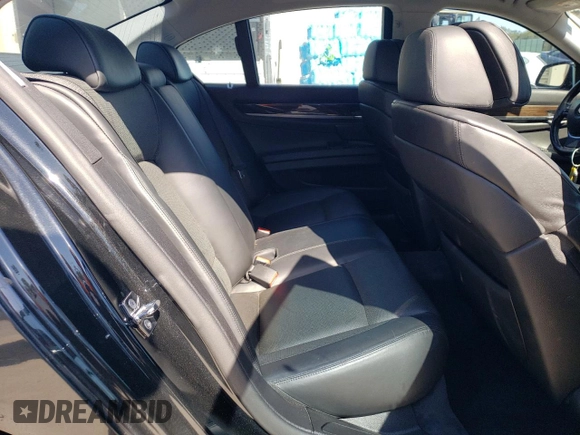 2009 BMW 7 Series 750i z VIN WBAKA83549CY33241, wystawiony jako Copart lot #75237884 z przebiegiem 130 585 mil mil oraz Szkoda całkowita • Salvage title. Historia ofert i sprzedaży dostępna na DreamBid. Obrazek 10.