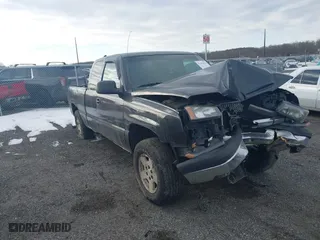 2003 Chevrolet Silverado 1500 LS with VIN 2GCEK19VX31260807, listed as a IAAI auction lot 41443970 with 180,000 mi miles. Bid and sale history available at carsss.com. Image 1.