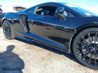 2020 McLaren GT with VIN SBM22GCA1LW000498, listed as a IAAI auction lot 41265247 with 18,465 mi miles. Bid and sale history available at carsss.com. Image 18.