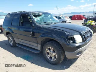 2003 Ford Explorer Sport XLS z VIN 1FMYU60E13UB36023, wystawiony jako IAAI lot #42103714 z przebiegiem 172 565 mil mil oraz . Historia ofert i sprzedaży dostępna na DreamBid. Obrazek 1.