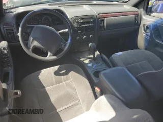 2000 Jeep Grand Cherokee Laredo with VIN 1J4G248S1YC407769, listed as a Copart auction lot 61653545 with 188,882 mi miles and Salvage title. Bid and sale history available at DreamBid. Image 8.