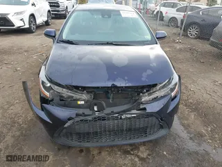 2021 Toyota Corolla LE with VIN JTDVPMAE2MJ155121, listed as a IAAI auction lot 41683464 with 205,384 mi miles. Bid and sale history available at carsss.com. Image 6.
