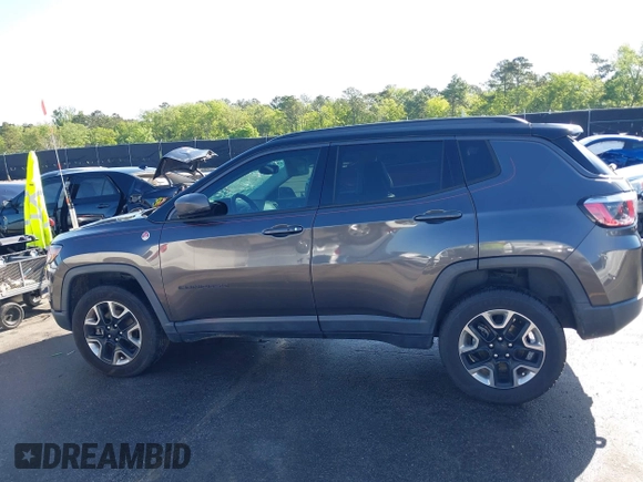 2018 Jeep Compass Trailhawk with VIN 3C4NJDDB3JT231923, listed as a IAAI auction lot 41929198 with 129,001 mi miles and . Bid and sale history available at carsss.com. Image 14.