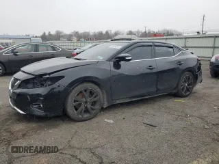 2020 Nissan Maxima SR with VIN 1N4AA6EV7LC369214, listed as a Copart auction lot 85699354 with 60,797 mi miles and Salvage Title. Bid and sale history available at DreamBid. Image 1.