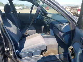 1991 Toyota Camry z VIN JT2SV21W3M0389983, wystawiony jako IAAI lot #42448678 z przebiegiem 312 034 mil mil oraz . Historia ofert i sprzedaży dostępna na DreamBid. Obrazek 5.