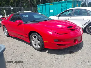 2002 Pontiac Firebird Formula z VIN 2G2FV22GX22110027, wystawiony jako IAAI lot #42498215 z przebiegiem 141 736 mil mil oraz . Historia ofert i sprzedaży dostępna na DreamBid. Obrazek 1.
