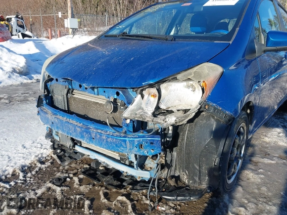 2012 Toyota Yaris L with VIN JTDKTUD31CD504632, listed as a IAAI auction lot 41660676 with 105,789 mi miles. Bid and sale history available at carsss.com. Image 6.