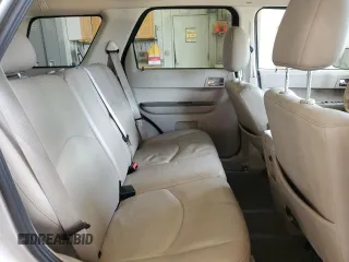 2008 Mercury Mariner Premier z VIN 4M2CU87108KJ13679, wystawiony jako Copart lot #56635785 z przebiegiem 166 732 mil mil oraz Szkody całkowita. Historia ofert i sprzedaży dostępna na DreamBid. Obrazek 11.