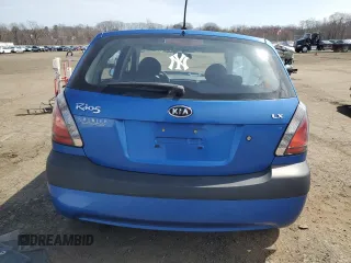 2009 Kia Rio LX with VIN KNADE243296500963, listed as a Copart auction lot 51061595 with 76,596 mi miles and Salvage Title. Bid and sale history available at carsss.com. Image 6.