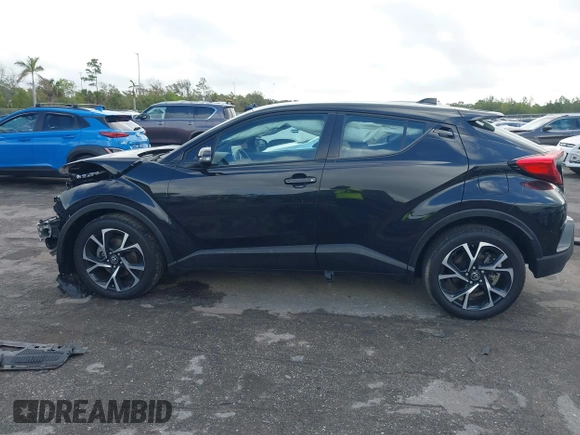2019 Toyota C-HR XLE with VIN NMTKHMBX2KR100540, listed as a IAAI auction lot 41124095 with 38,073 mi miles and . Bid and sale history available at DreamBid. Image 15.