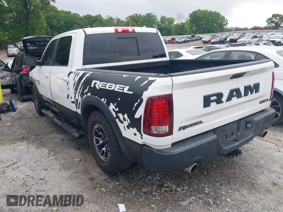 2017 Ram 1500 Rebel with VIN 1C6RR7YT7HS575529, listed as a IAAI auction lot 42125529 with 110,722 mi miles and . Bid and sale history available at DreamBid. Image 3.