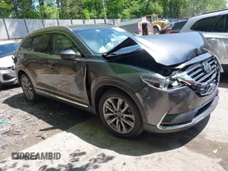 2023 Mazda CX-9 Grand Touring z VIN JM3TCBDY7P0632172, wystawiony jako IAAI lot #42264316 z przebiegiem 36 271 mil mil oraz . Historia ofert i sprzedaży dostępna na DreamBid. Obrazek 1.