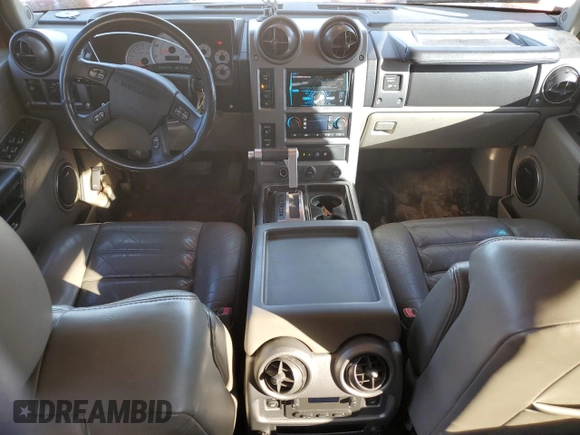 2003 Hummer H2 with VIN 5GRGN23U33H125797, listed as a Copart auction lot 77170554 with 166,739 mi miles and Clean Title. Bid and sale history available at carsss.com. Image 8.
