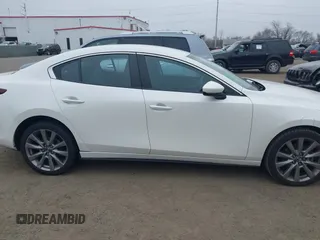 2021 Mazda 3 Select with VIN JM1BPBBL4M1340257, listed as a IAAI auction lot 41796721 with 24,861 mi miles and . Bid and sale history available at carsss.com. Image 13.