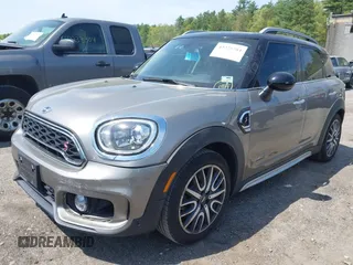 2017 MINI Countryman Cooper S z VIN WMZYT5C33H3D79148, wystawiony jako IAAI lot #42225781 z przebiegiem 95 023 mil mil oraz . Historia ofert i sprzedaży dostępna na DreamBid. Obrazek 2.