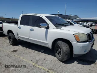 2004 Nissan Titan SE with VIN 1N6AA07A24N521744, listed as a Copart auction lot 58012925 with 268,270 mi miles and Salvage title. Bid and sale history available at DreamBid. Image 4.