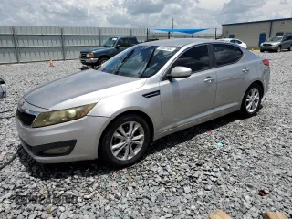 2013 Kia Optima EX z VIN 5XXGN4A7XDG184791, wystawiony jako Copart lot #60801885 z przebiegiem 233 885 mil mil oraz Szkoda całkowita • Salvage title. Historia ofert i sprzedaży dostępna na DreamBid. Obrazek 1.