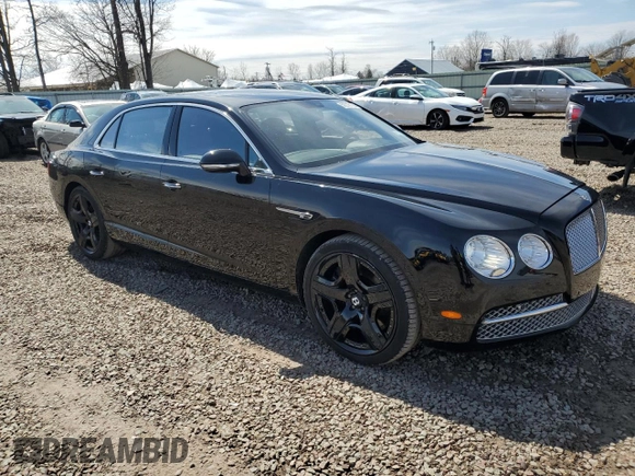 2014 Bentley Flying Spur with VIN SCBEC9ZA7EC095064, listed as a Copart auction lot 52218105 with 24,143 mi miles and Salvage title. Bid and sale history available at DreamBid. Image 4.