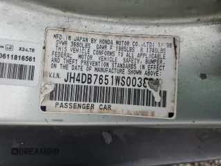 1998 Acura Integra LS with VIN JH4DB7651WS003881, listed as a Copart auction lot 87639025 with 156,999 mi miles and Salvage title. Bid and sale history available at DreamBid. Image 13.