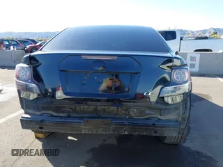 2015 Scion tC with VIN JTKJF5C79FJ003404, listed as a IAAI auction lot 41756024 with 128,906 mi miles. Bid and sale history available at carsss.com. Image 16.