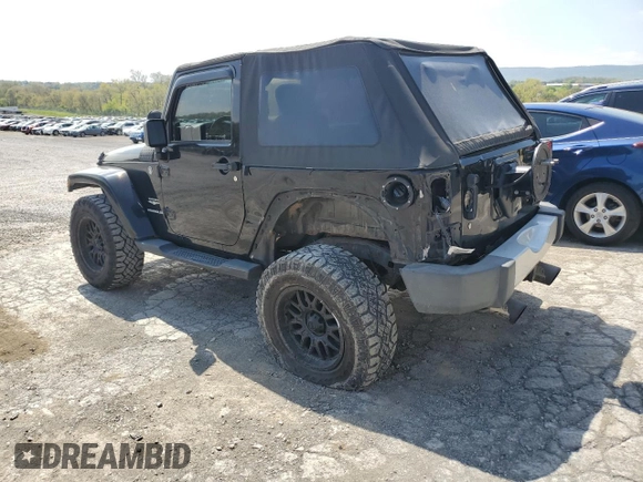 2011 Jeep Wrangler Sahara with VIN 1J4AA5D14BL542912, listed as a Copart auction lot 65158784 with 122,795 mi miles and Salvage Title. Bid and sale history available at DreamBid. Image 2.