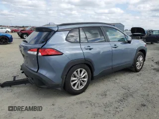2023 Toyota Corolla Cross LE z VIN 7MUBAAAG6PV039602, wystawiony jako Copart lot #53419475 z przebiegiem 34 033 mil mil oraz Szkoda całkowita • Salvage title. Historia ofert i sprzedaży dostępna na DreamBid. Obrazek 3.