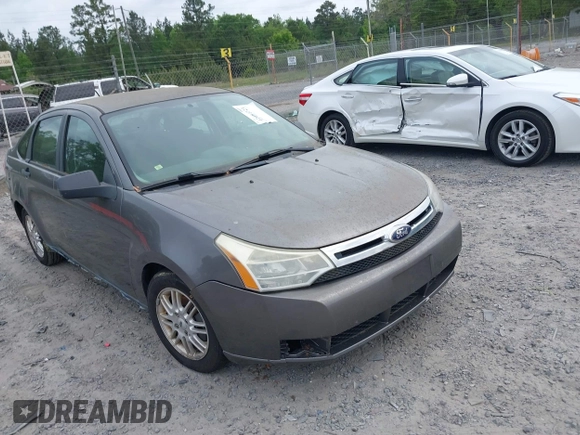 2009 Ford Focus SE with VIN 1FAHP35N49W178711, listed as a IAAI auction lot 42084721 with 203,889 mi miles. Bid and sale history available at carsss.com. Image 1.