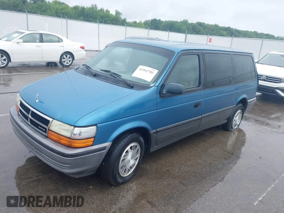 1992 Dodge Grand Caravan z VIN 1B4GH54R6NX218758, wystawiony jako IAAI lot #42362782 z przebiegiem 172 142 mil mil oraz . Historia ofert i sprzedaży dostępna na DreamBid. Obrazek 2.
