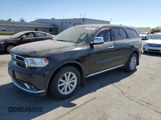 2015 Dodge Durango SXT with VIN 1C4RDHAG6FC809712, listed as a Copart auction lot 62100335 with 101,086 mi miles and Salvage title. Bid and sale history available at DreamBid. Image 1.