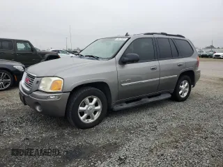2006 GMC Envoy SLT with VIN 1GKDS13S962138197, listed as a Copart auction lot 85679094 with 166,376 mi miles and Salvage Title. Bid and sale history available at carsss.com. Image 1.