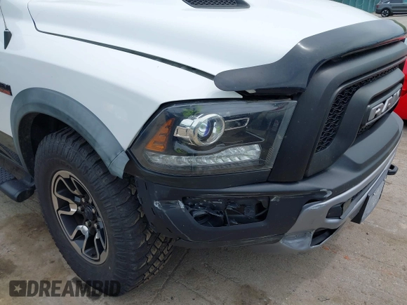 2016 Ram 1500 Rebel with VIN 1C6RR7YTXGS417801, listed as a IAAI auction lot 42382016 with 142,636 mi miles and . Bid and sale history available at DreamBid. Image 6.