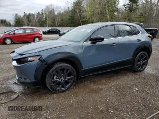 2023 Mazda CX-30 S Premium z VIN 3MVDMBDM5PM538276, wystawiony jako Copart lot #54654615 z przebiegiem 35 629 mil mil oraz Szkoda całkowita • Salvage title. Historia ofert i sprzedaży dostępna na DreamBid. Obrazek 1.