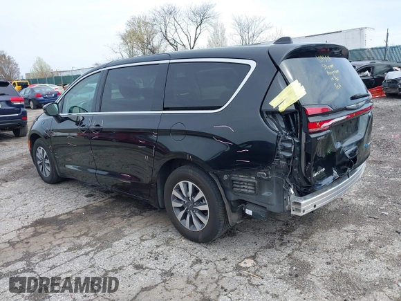 2023 Chrysler Pacifica Hybrid Touring L z VIN 2C4RC1L70PR575342, wystawiony jako IAAI lot #41946079 z przebiegiem 36 304 mil mil oraz . Historia ofert i sprzedaży dostępna na DreamBid. Obrazek 3.