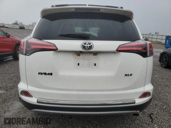 2018 Toyota RAV4 XLE with VIN JTMWFREV3JJ746262, listed as a Copart auction lot 51811035 with 84,319 mi miles and Salvage Title. Bid and sale history available at DreamBid. Image 6.