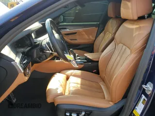 2020 BMW 5 Series M550i xDrive with VIN WBAJS7C0XLBN96338, listed as a Copart auction lot 60591815 with 73,910 mi miles and Salvage title. Bid and sale history available at DreamBid. Image 7.