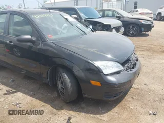 2007 Ford Focus S with VIN 1FAFP34N97W303613, listed as a IAAI auction lot 42569973 with 141,821 mi miles and . Bid and sale history available at DreamBid. Image 1.