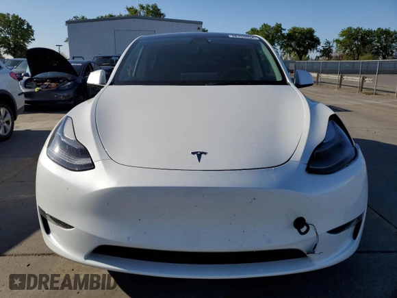 2022 Tesla Model Y Performance с VIN 7SAYGDEF4NF381656, выставлен на аукционе Copart как лот 48758954 с пробегом 18 335 миль миль и Списание • Salvage title. История ставок и продаж доступна на DreamBid. Изображение 5.