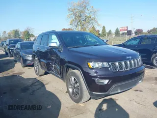 2021 Jeep Grand Cherokee 80th Anniversary with VIN 1C4RJFBG6MC711983, listed as a IAAI auction lot 40633511 with 22,480 mi miles and . Bid and sale history available at DreamBid. Image 1.